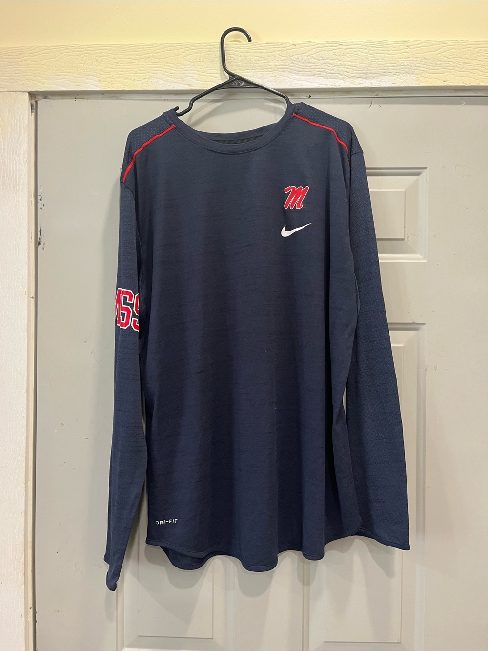 Ole Miss Nike Navy Long-Sleeve Performance Tee with Red Accents